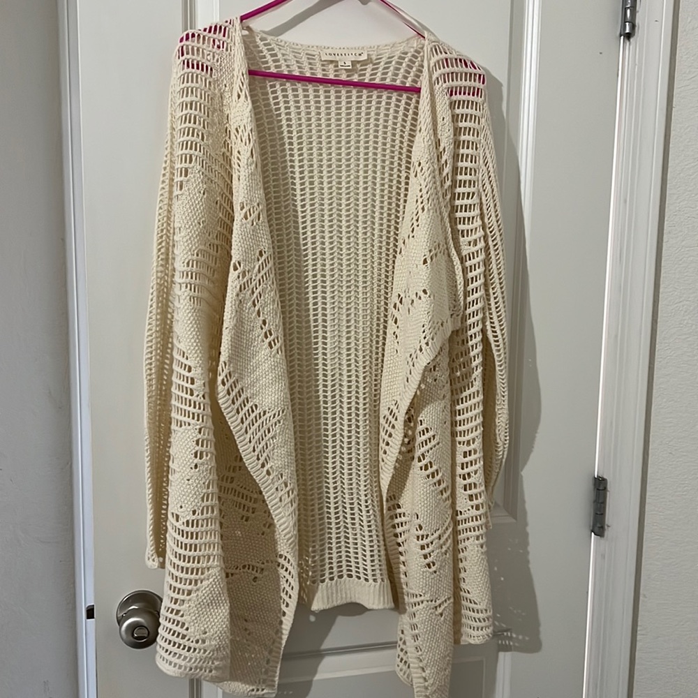 A classic bohemian style, our timeless crochet cardigan